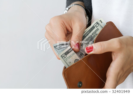 The girl holding an open leather orange slim 32401949