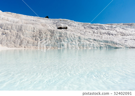 Natural travertine pools and terraces at Pamukkale 32402091