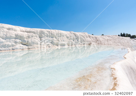Natural travertine pools and terraces at Pamukkale 32402097