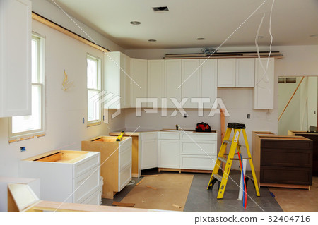 Installing new induction hob modern kitchen Installing new induction hob modern kitchen 32404716