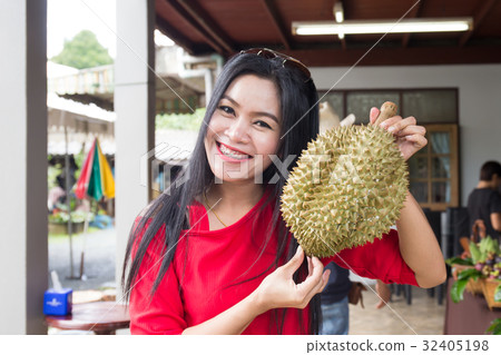 Nice Woman holding Durian Nice Woman holding Durian 32405198