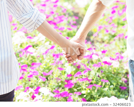 A hand connected to the flower bed flower A hand connected to the flower bed flower 32406023