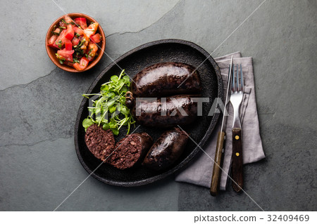 Bloody sausages - chilean preta on iron plate, top 32409469