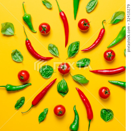 Above view at Chili pepper and tomatoes with basil Above view at Chili pepper and tomatoes with basil 32410279
