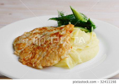Plate with chopped pork in breading and potato Plate with chopped pork in breading and potato 32411198