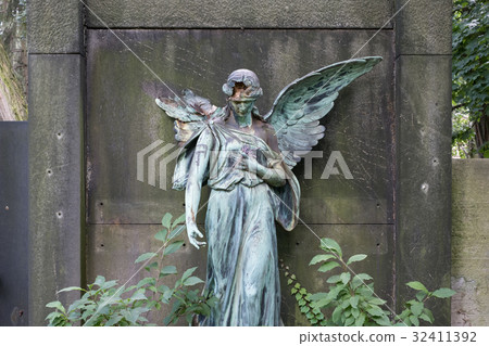 damaged sculpture of a female angel statue 32411392