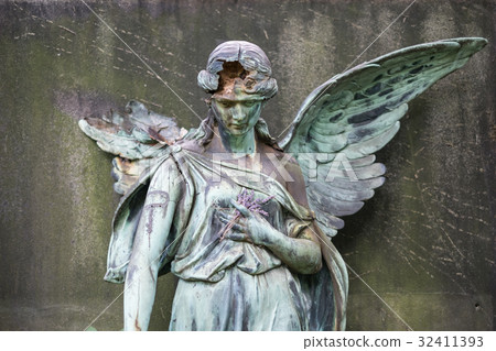 damaged sculpture of a female angel statue damaged sculpture of a female angel statue 32411393