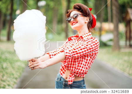 Glamour pin up girl with retro rotary telephones 32411689