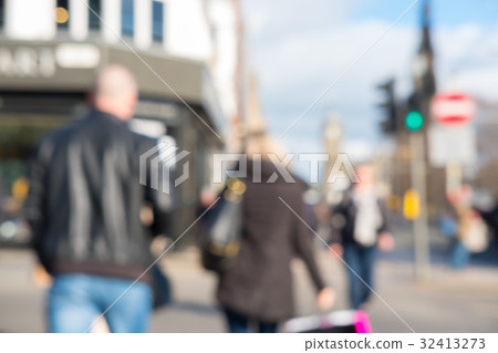 Blurred image of People walking on the street Blurred image of People walking on the street 32413273
