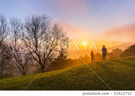 couple selfie with relax motion in sunset time couple selfie with relax motion in sunset time 32422752
