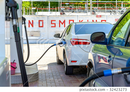 Car at gas station Car at gas station 32423273
