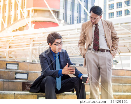 Business partner discussing together plan. Business partner discussing together plan. 32429161