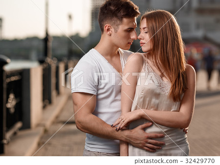Portrait of young couple in love, enjoying the Portrait of young couple in love, enjoying the 32429770