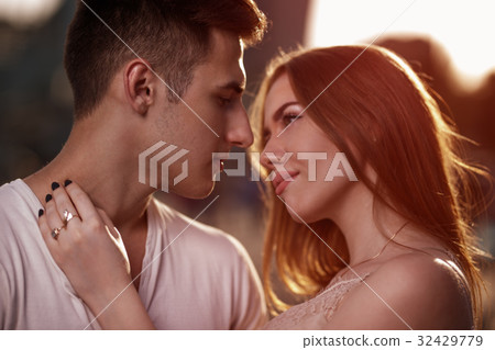 Portrait of young couple in love, enjoying the 32429779
