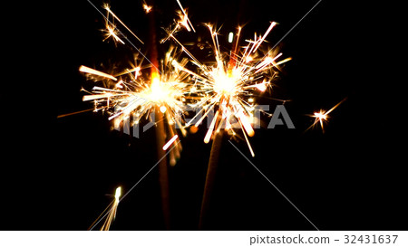 Burning Sparklers. Christmas and New Year lights. 32431637