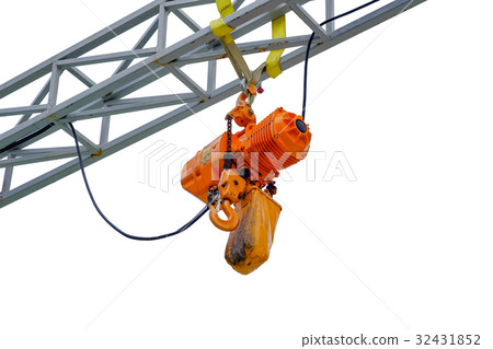 Orange hoist hangs on a steel frame Orange hoist hangs on a steel frame 32431852