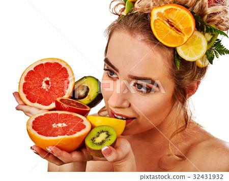 Hair mask from fresh fruits on woman head. Girl 32431932