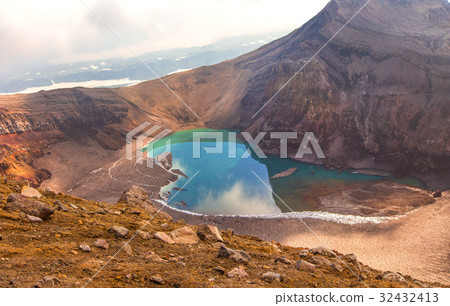 Green lake in the mouth of Gorely volcano 32432413