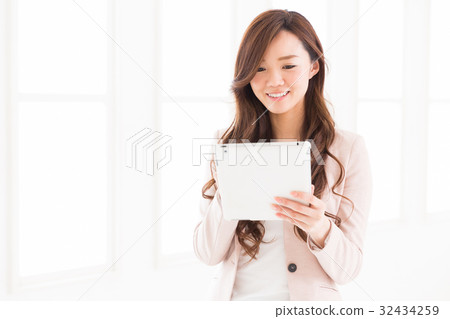 Woman business watching tablet Woman business watching tablet 32434259