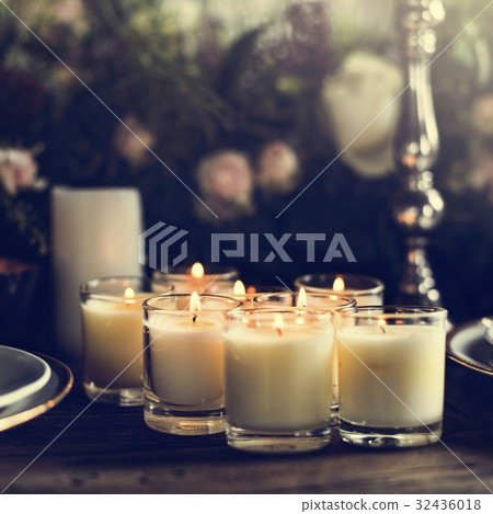 Candles Lighten Up on Table for Reception Dining in Restaurant 32436018