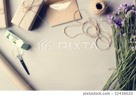 Statis Flowers Arrangement with Present Gift Box Copy Space Statis Flowers Arrangement with Present Gift Box Copy Space 32436020