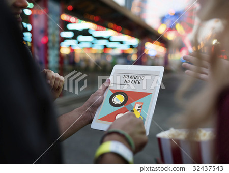 Group of people listening to leisure music activity on digital tablet Group of people listening to leisure music activity on digital tablet 32437543