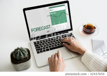 Climate change data on a device screen Climate change data on a device screen 32437650
