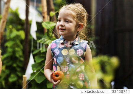 Kids having fun gardening outdoor Kids having fun gardening outdoor 32438744