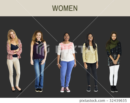 Diverse group of cheerful girls standing in a row Diverse group of cheerful girls standing in a row 32439635