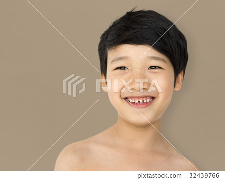 Smiling asian ethnicity boy in a shoot Smiling asian ethnicity boy in a shoot 32439766