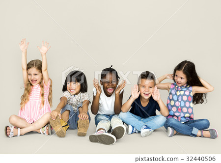 Group of happiness little children sitting on the floor 32440506