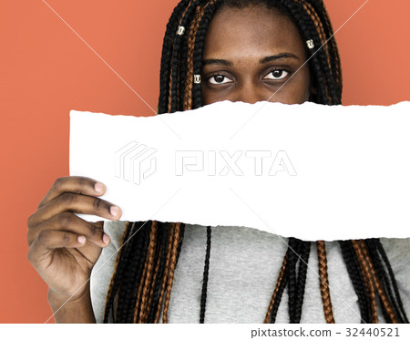African descent girl is holding a blank paper African descent girl is holding a blank paper 32440521