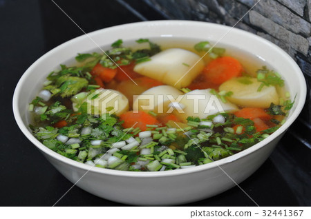 egg tofu and carrot chicken soup topping chop spri 32441367