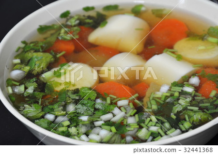 egg tofu and carrot chicken soup topping chop spri 32441368