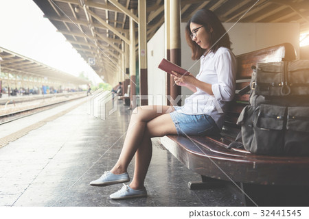 Young Woman is reading on her diary. Young Woman is reading on her diary. 32441545