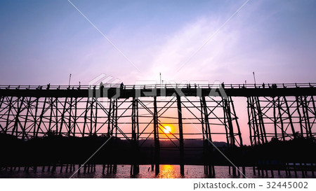 Silhouetted bridge at sunset 32445002