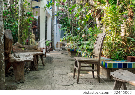 Old Wooden Bench and chair in the garden 32445003