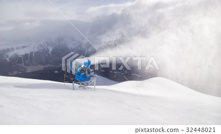 Cannon shoots snow in the Swiss Alps tourist area Cannon shoots snow in the Swiss Alps tourist area 32448021