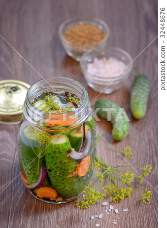 Pickled cucumbers, homemade preserved Pickled cucumbers, homemade preserved 32448676