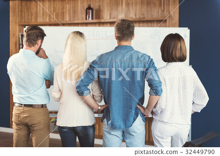 Youthful ladies and guys learning new job 32449790