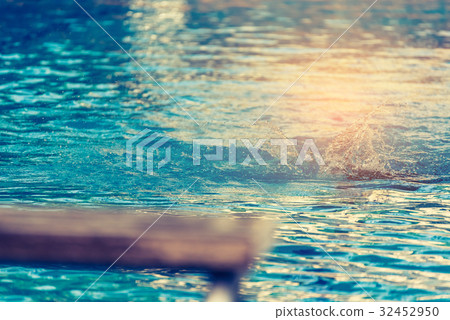 platform and swimmer in swimming pool. platform and swimmer in swimming pool. 32452950