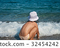 girl plays with waves 32454242