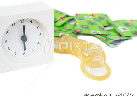 Condom and clock Condom and clock 32454376