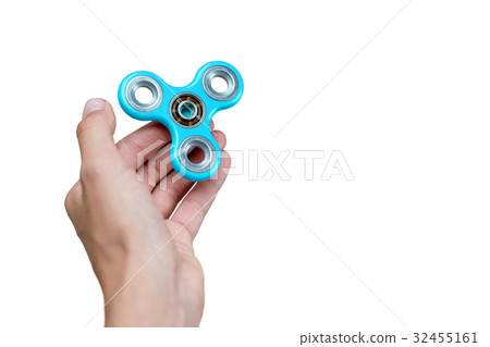 Fidget spinner. Blue hand spinner, fidgeting hand 32455161