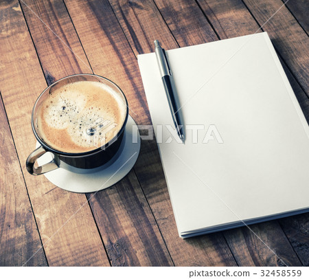 Book, pencil, coffee cup 32458559