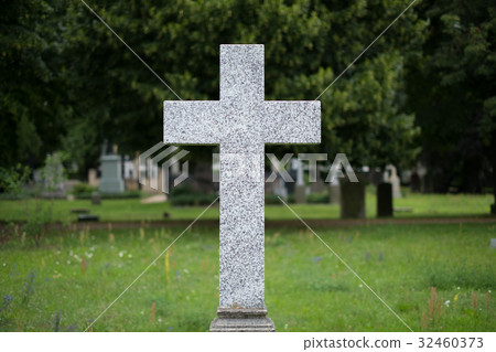 Stone cross gravestones on cemetery - graveyard Stone cross gravestones on cemetery - graveyard 32460373