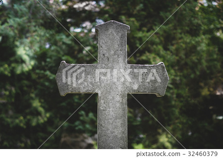 Stone cross gravestones on cemetery - graveyard Stone cross gravestones on cemetery - graveyard 32460379