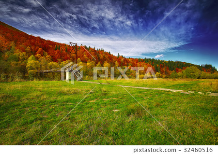 Wooden bridge over mountain river Wooden bridge over mountain river 32460516