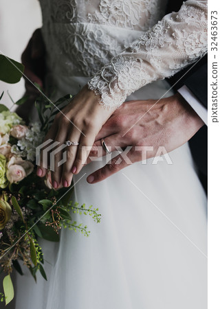 Bride and Groom Showing Their Engagement Wedding Rings on Hands Bride and Groom Showing Their Engagement Wedding Rings on Hands 32463673