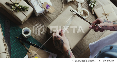 Craft design simplify wrapping gift on wooden table Craft design simplify wrapping gift on wooden table 32463686